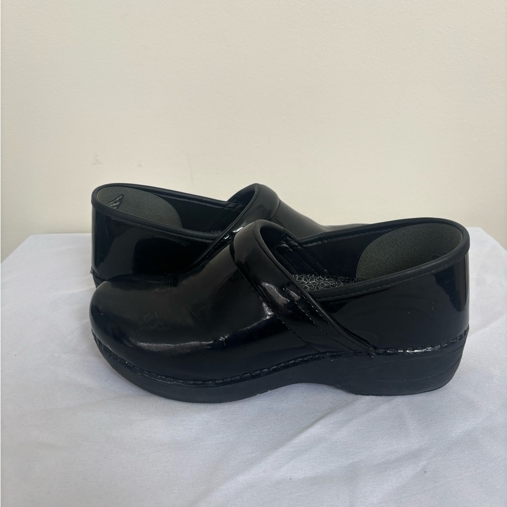 Dansko Black Patent Leather Clogs